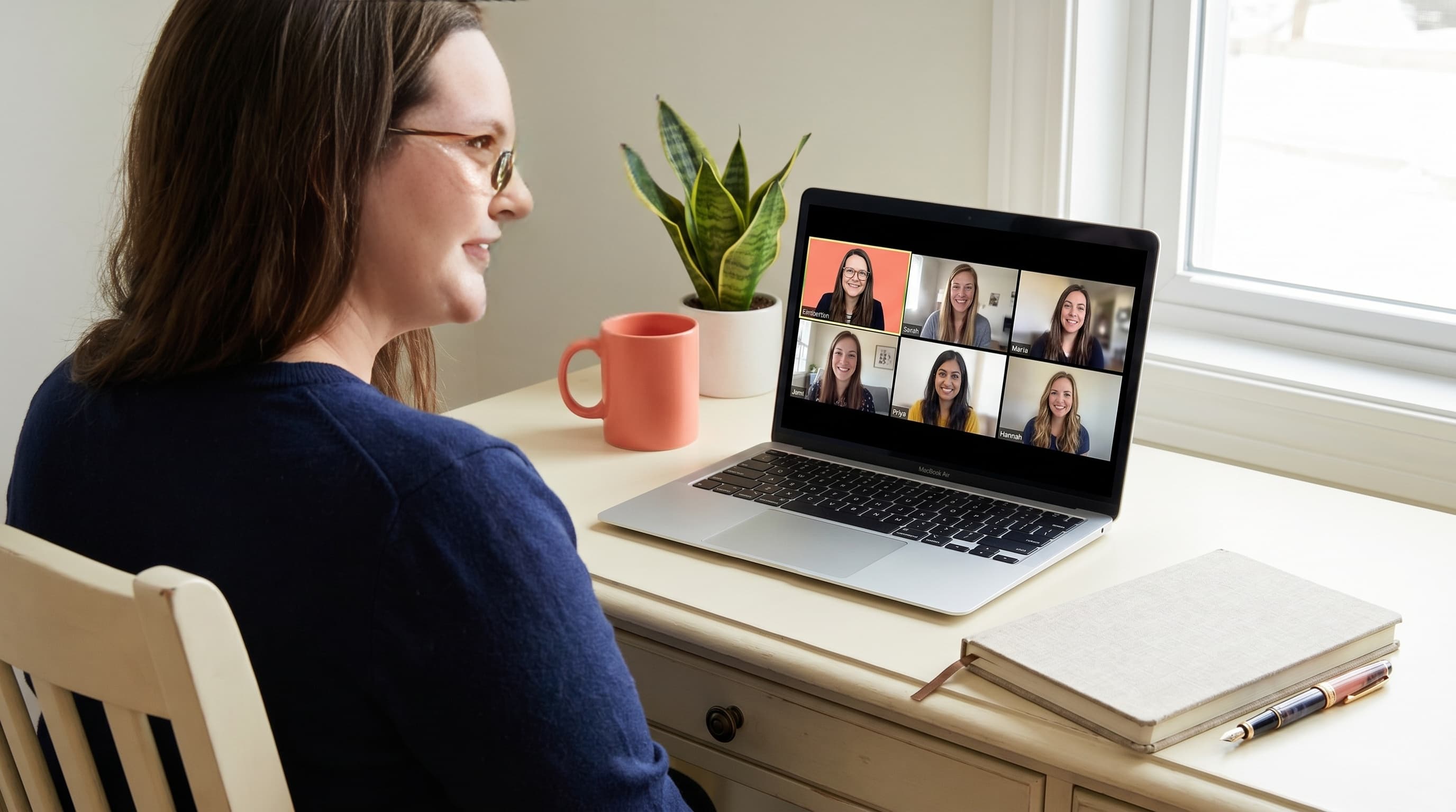 Lindsey leading a Zoom coaching session with five women on screen